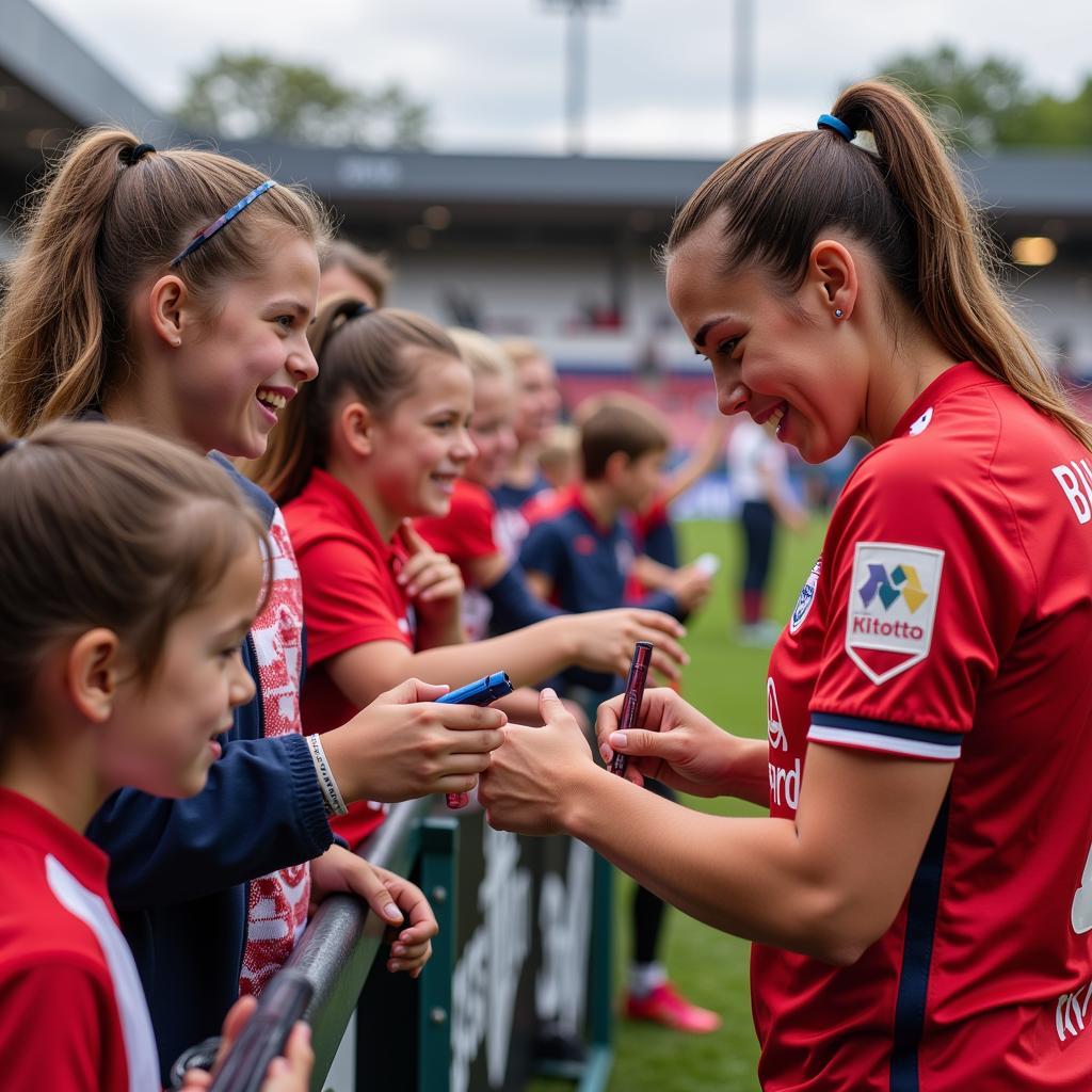 Aldona Bajrami gibt Autogramme nach dem Spiel