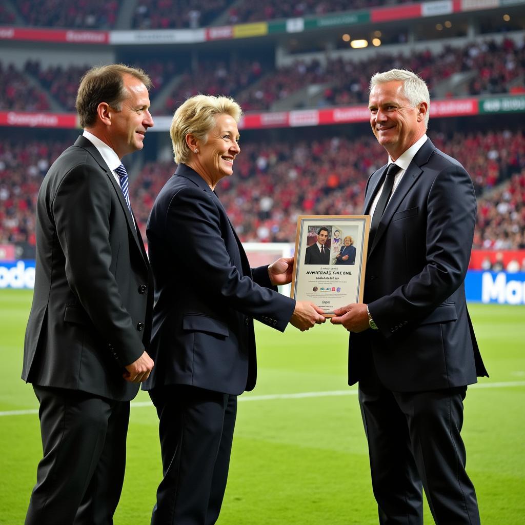 Angelika Seidel being honored by Bayer Leverkusen for her contributions