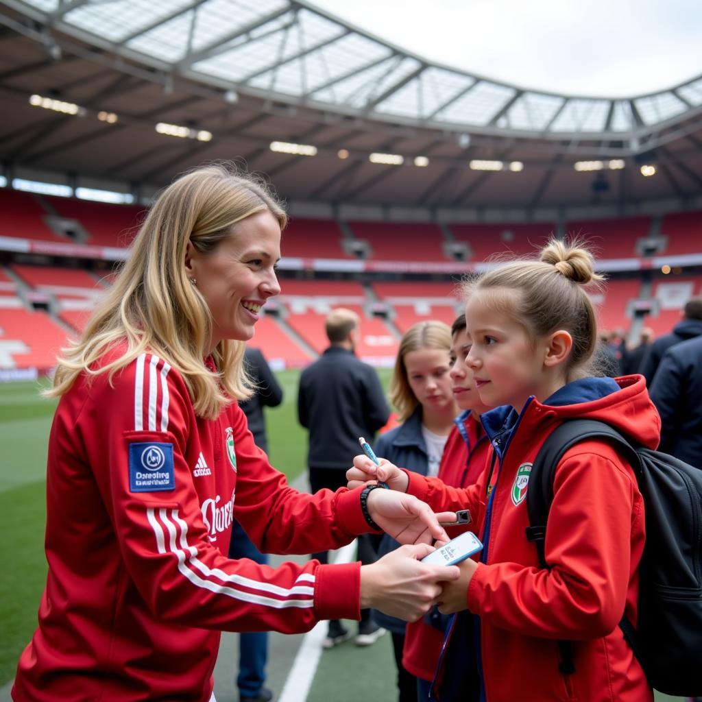 Anja Tegler mit Fans in Leverkusen