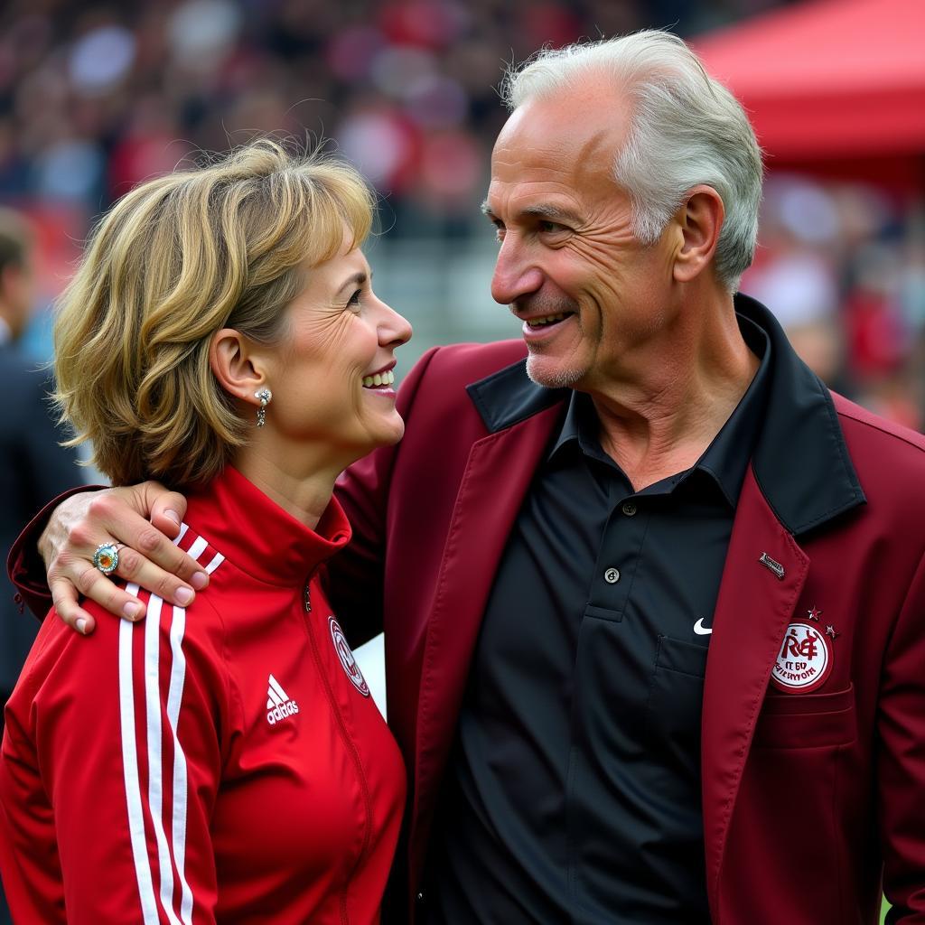 Annette Becker trifft Rudi Völler bei einer Veranstaltung von Bayer 04 Leverkusen