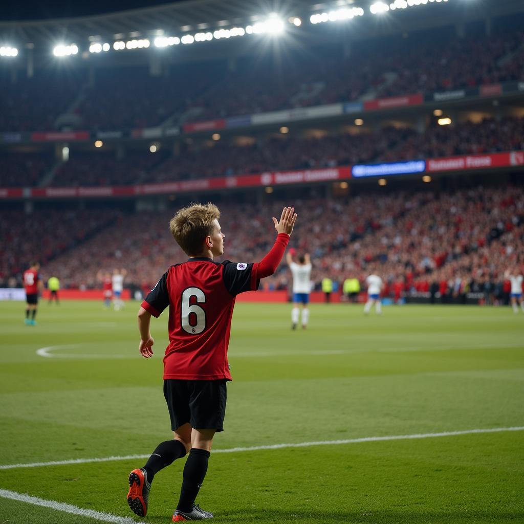 Attilio Miniello grüßt die Fans in der BayArena