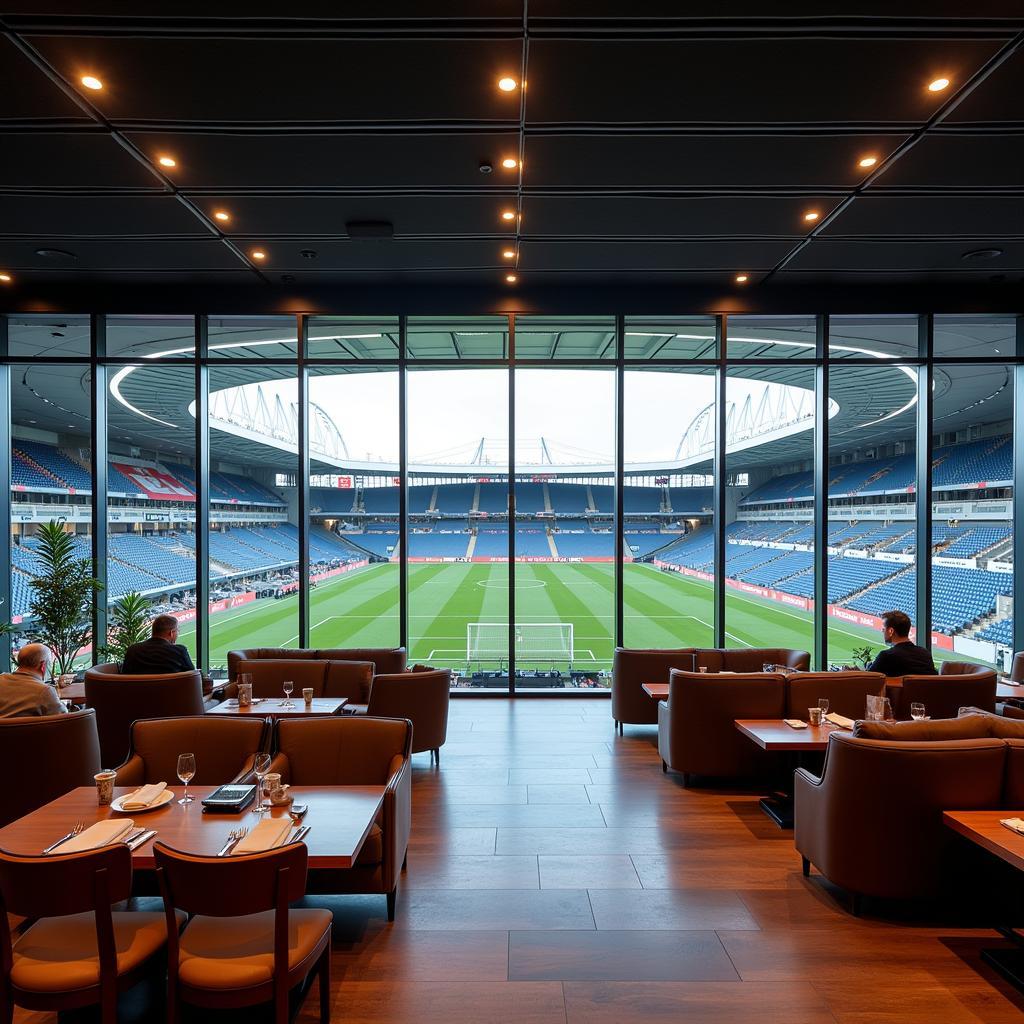 Innenansicht des VIP-Bereichs der BayArena mit Blick auf das Spielfeld