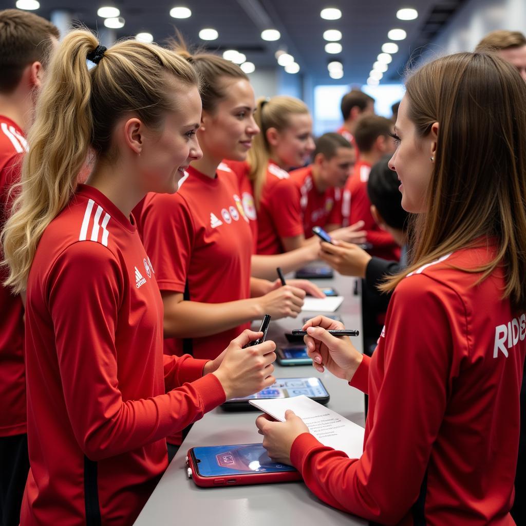 Der Bayer 04 Leverkusen Frauen Kader bei einem Fan-Event.