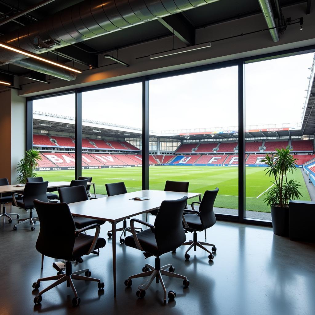 Moderner Arbeitsplatz im Bayer Leverkusen Coworking mit Blick auf das Spielfeld