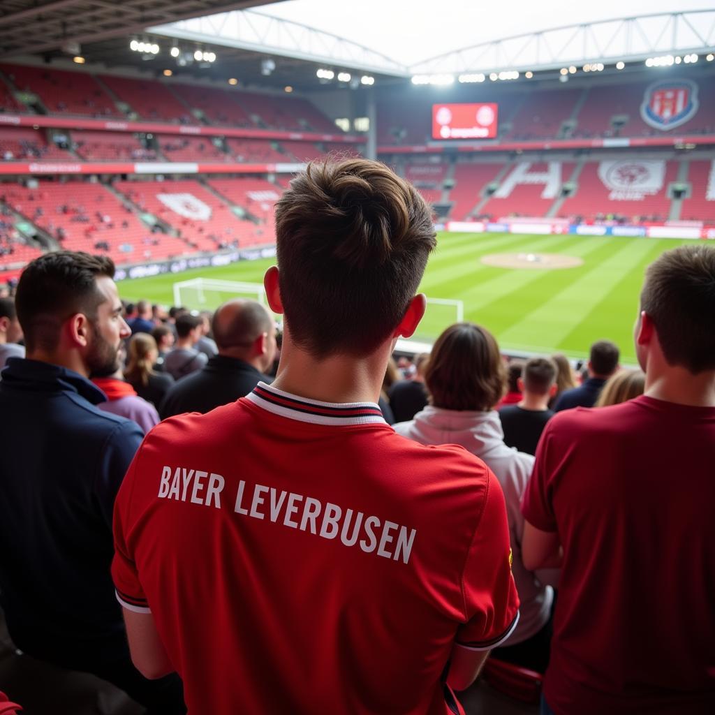 Bayer Leverkusen Fan mit Trikot