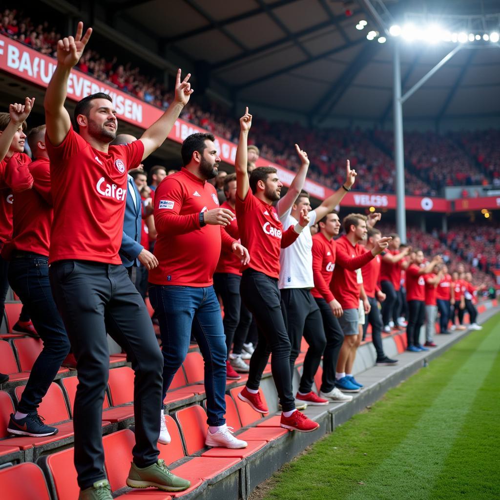 Bayer Leverkusen Fans feiern im Stadion