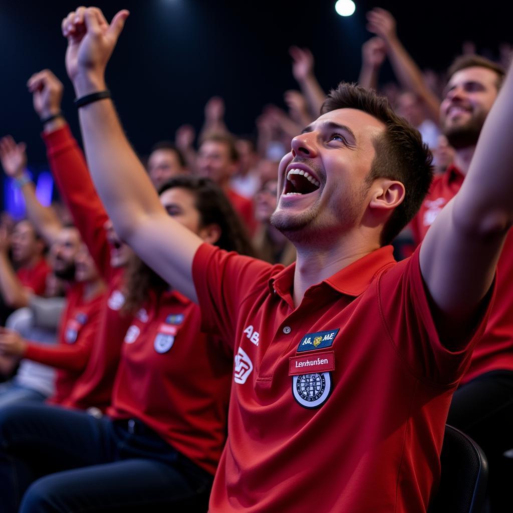 Fans von Bayer Leverkusen fiebern bei einem Dart-Turnier mit