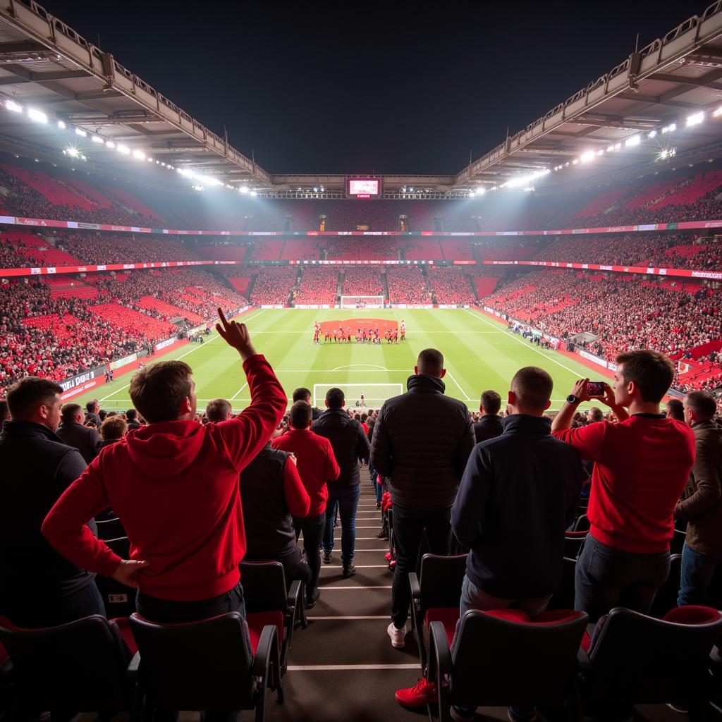 Fans von Hannover und Leverkusen im Stadion