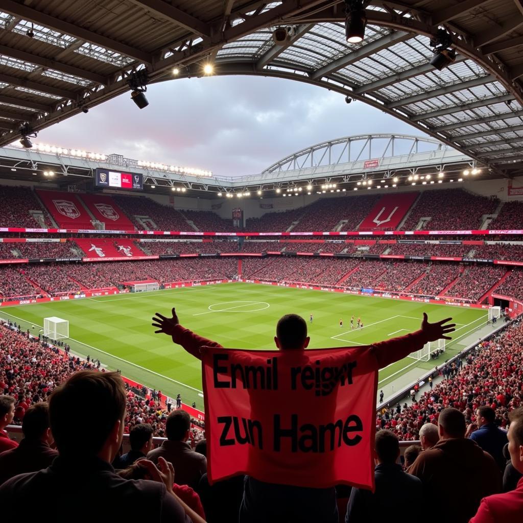 Fans in der BayArena mit Banner