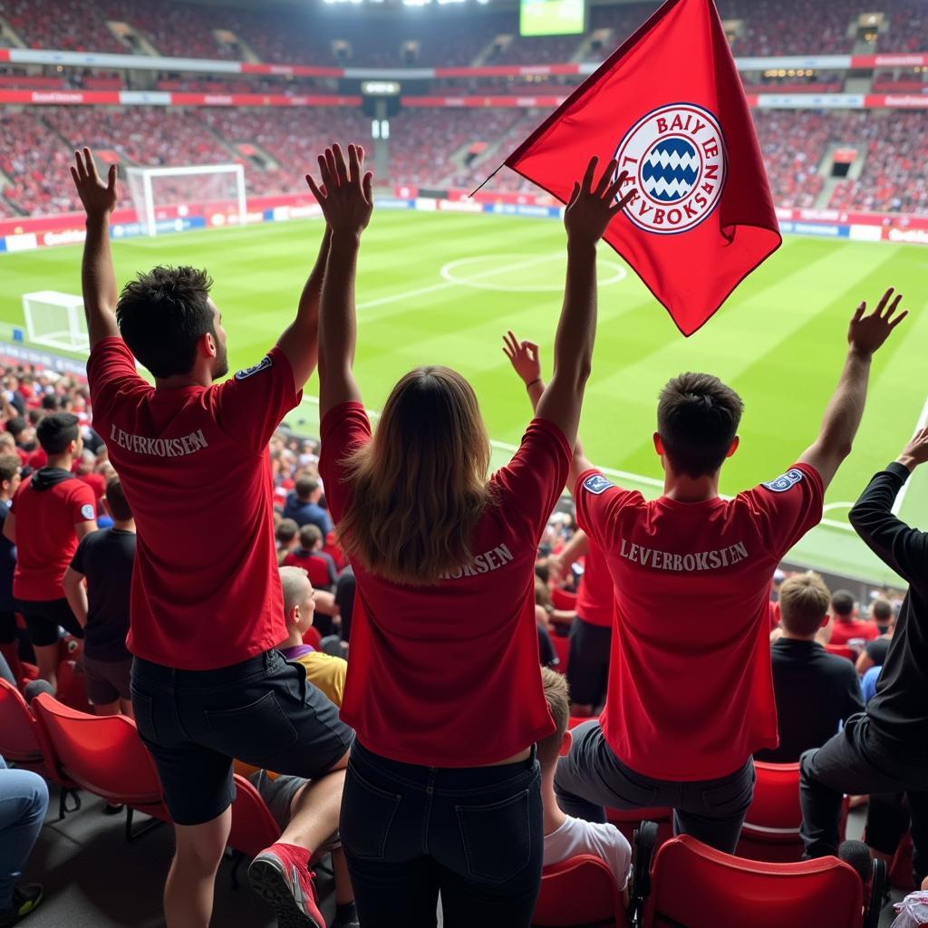 Fans von Bayer Leverkusen feiern auswärts