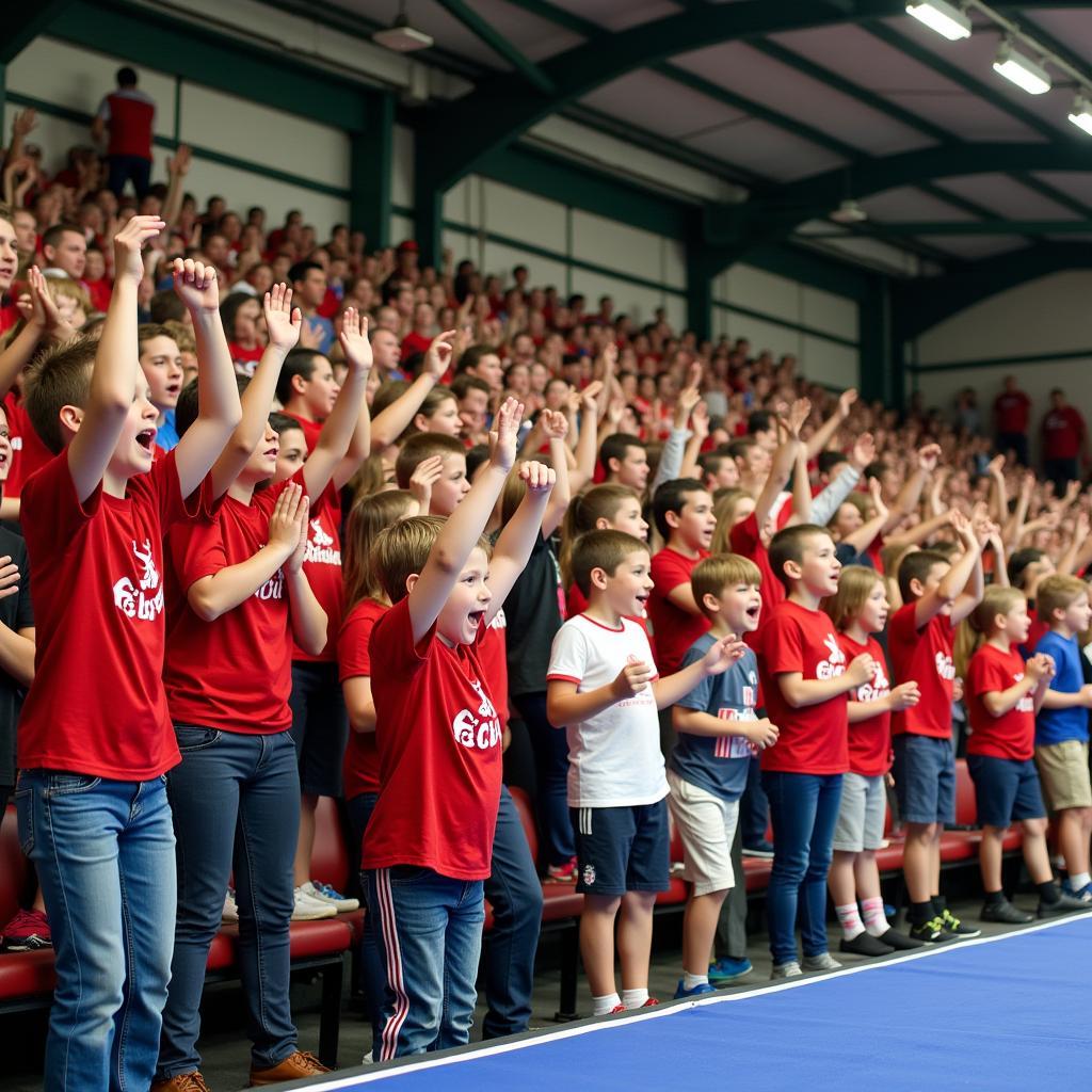 Fans feuern ihre Mannschaften beim Jugend-Hallenfußballturnier in Leverkusen an.