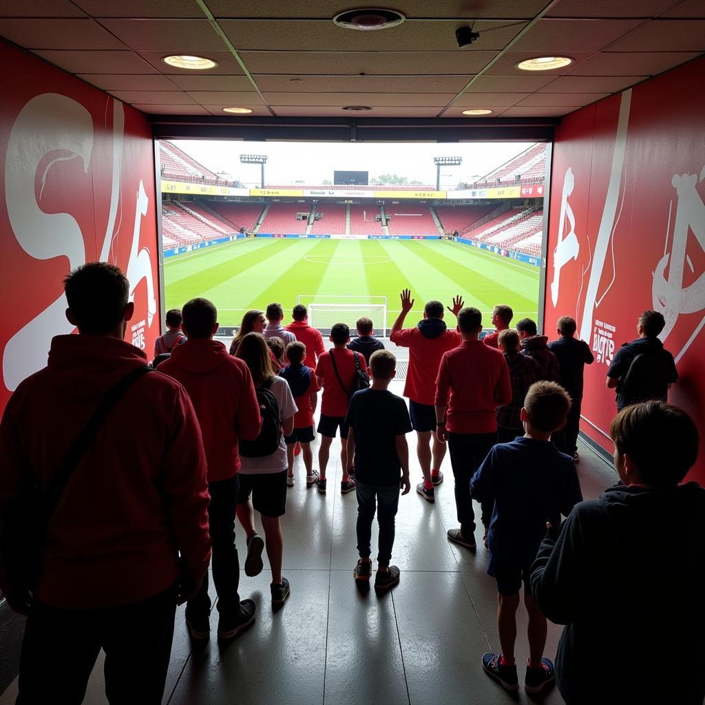 Fans auf einer Stadionführung durch die BayArena.