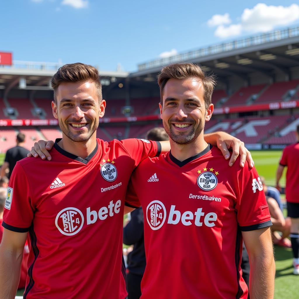 Fans genießen das sonnige Wetter in Leverkusen