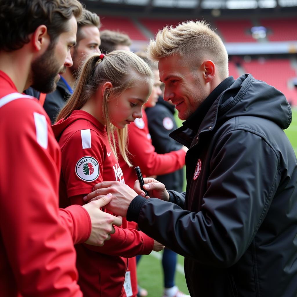 Andreas Zander mit Fans von Bayer 04 Leverkusen