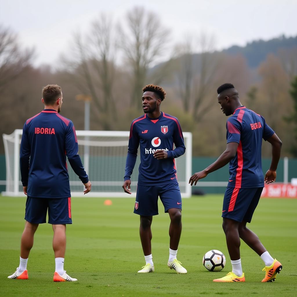 Josip Babić, Odilon Kossounou und Edmond Tapsoba im Training von Bayer Leverkusen.