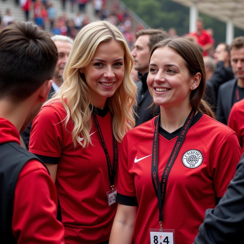 Barbara Löhrwald im Gespräch mit Fans von Bayer 04 Leverkusen