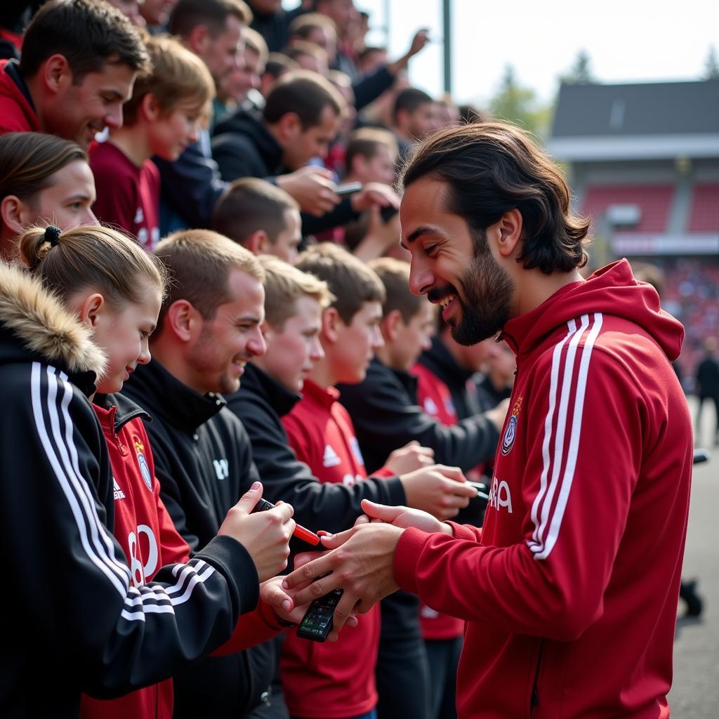 Baris Kartal mit Fans von Bayer 04 Leverkusen