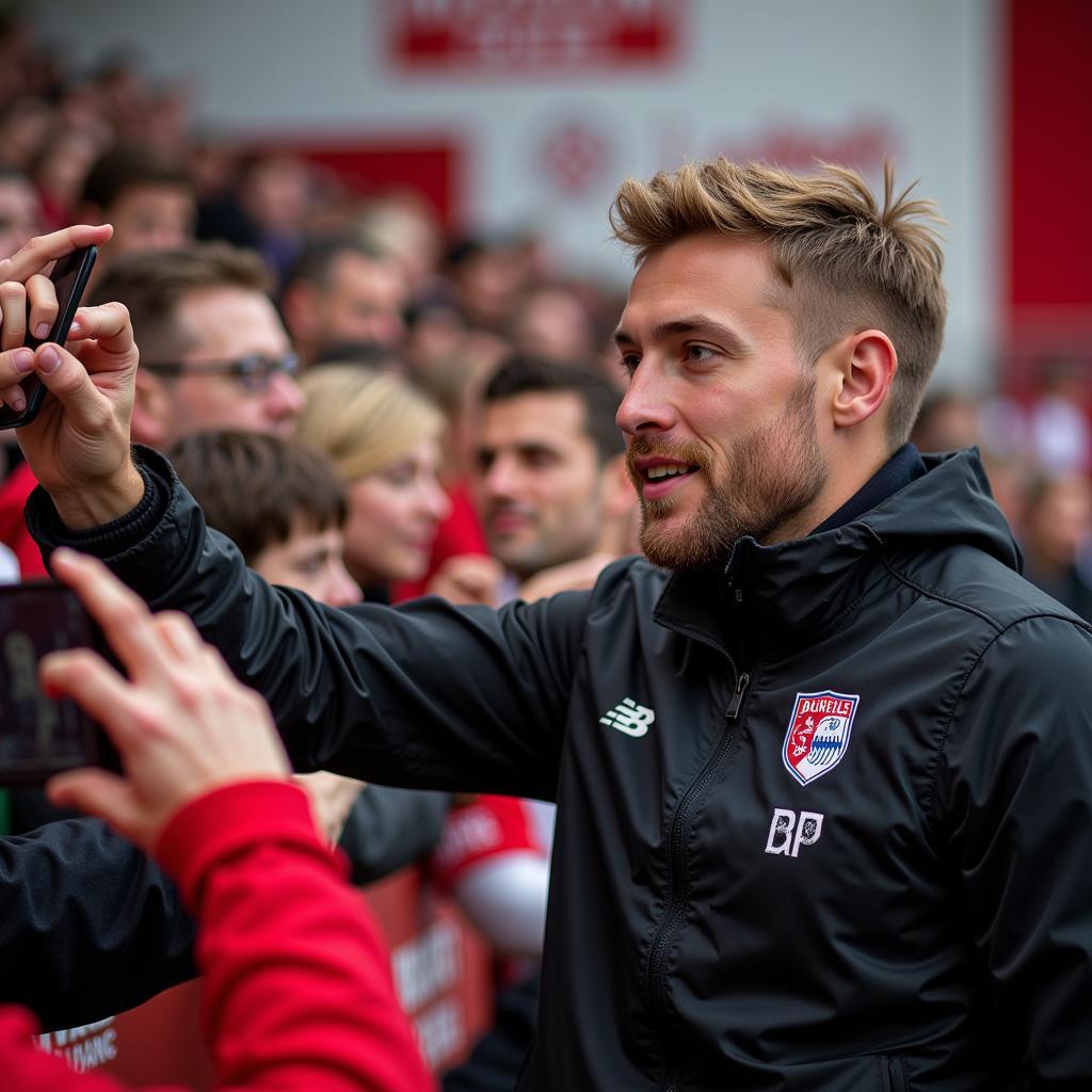 Bastian Bielendorfer trifft Fans von Bayer 04 Leverkusen.