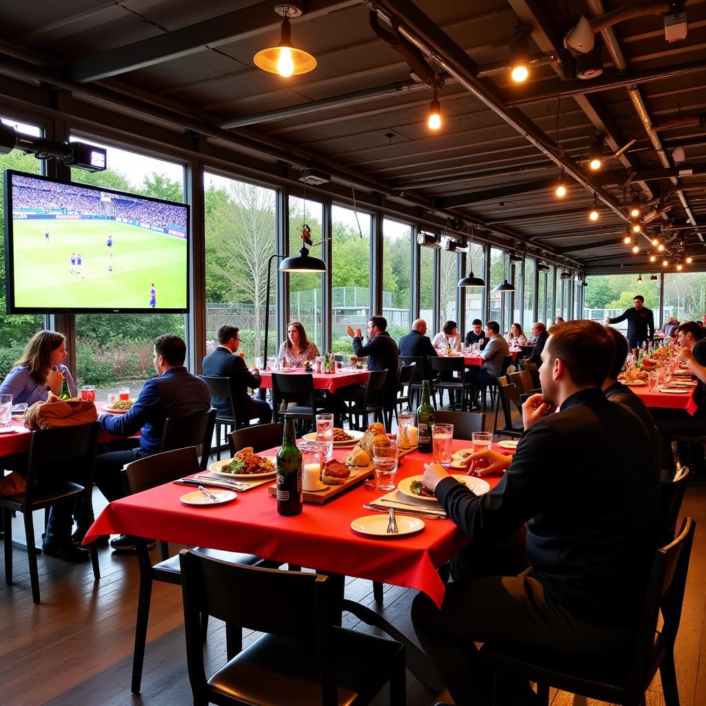 Veranstaltung im Bax Biergarten Leverkusen während eines Fußballspiels.