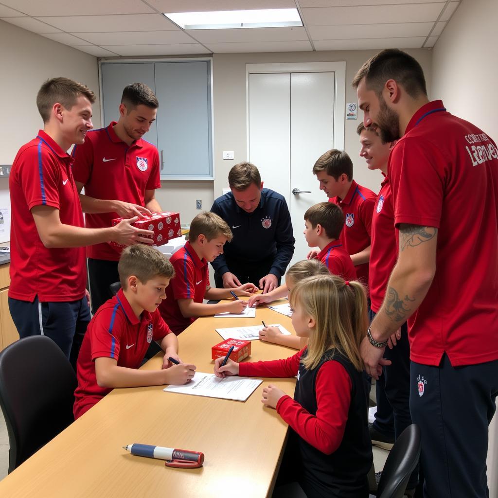 Bayer 04 Leverkusen Soziales Engagement - Spieler besuchen Kinder im Krankenhaus