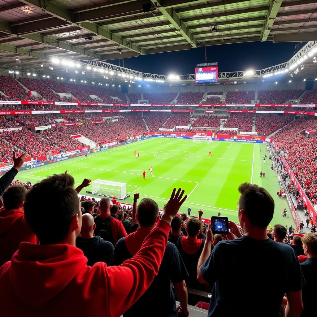 Fans von Bayer 04 Leverkusen und Union Saint-Gilloise im Stadion