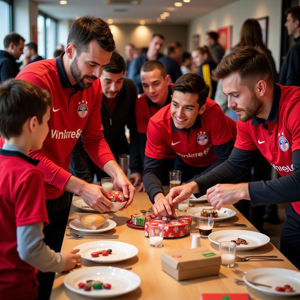 Bayer 04 Leverkusen Spieler helfen bei der Verteilung von Weihnachtspaketen an der Leverkusener Tafel 2018