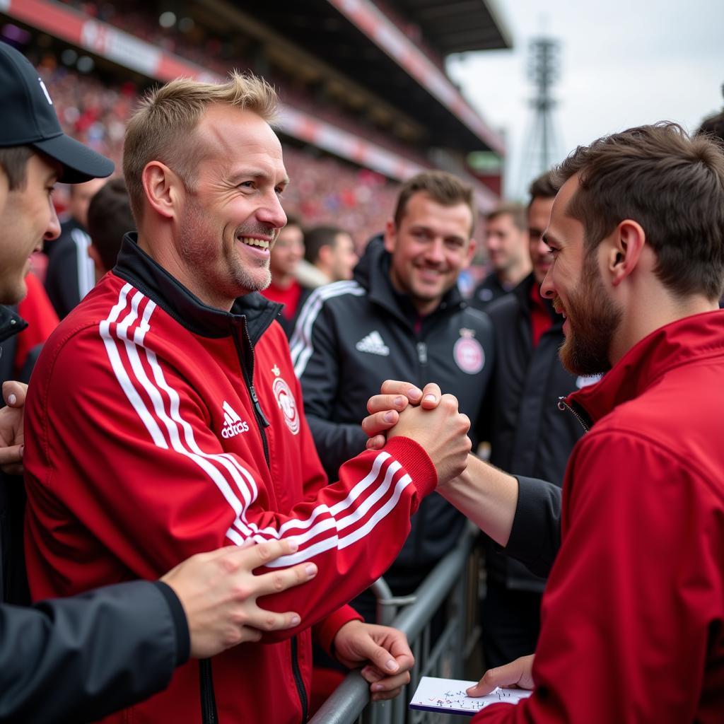 Reiner Calmund mit Fans.