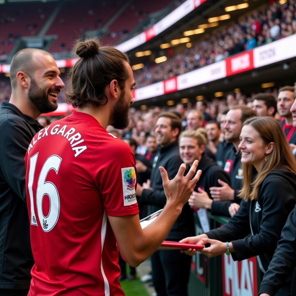 Aleix Garcia mit Fans in der BayArena.