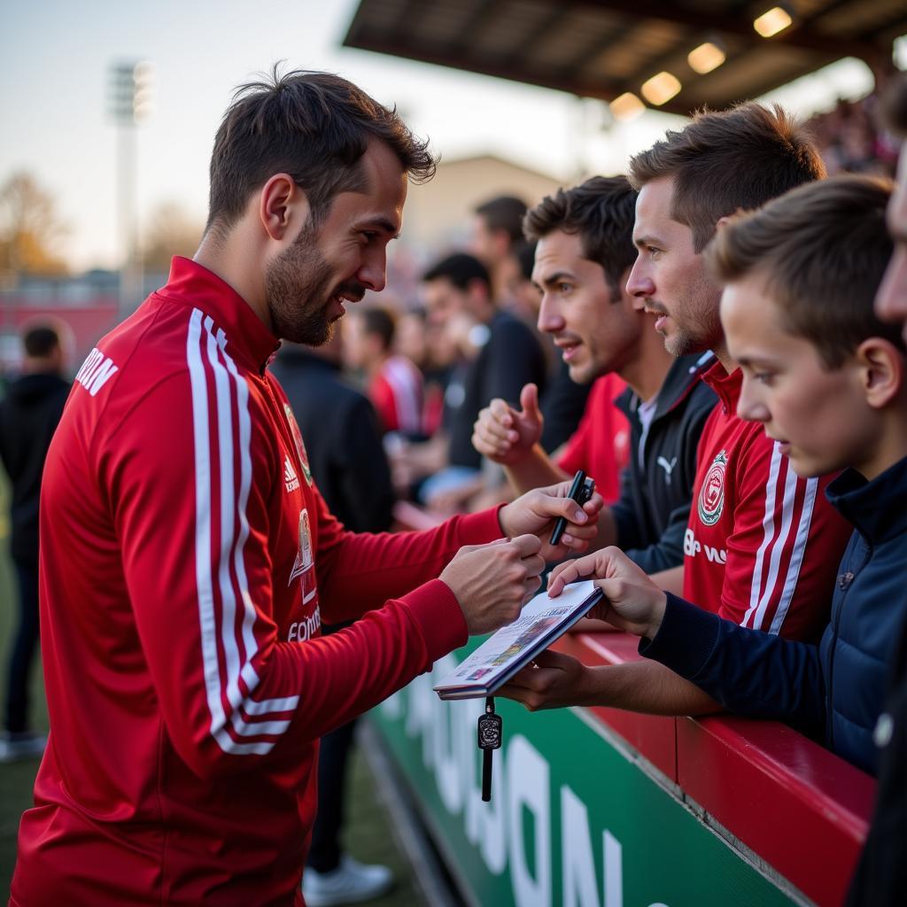 Andrzej Buncol mit Bayer Leverkusen Fans.