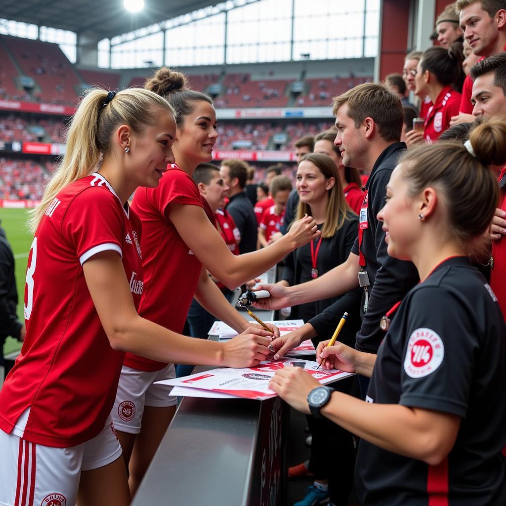 Anja Kleine-Boymann und Tita Stephan treffen Fans nach dem Spiel