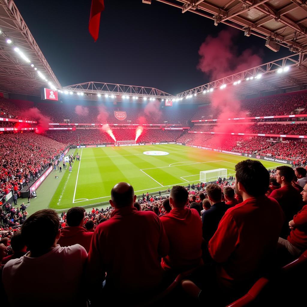 Die elektrisierende Atmosphäre im Block A1 der BayArena Leverkusen während eines Fußballspiels.