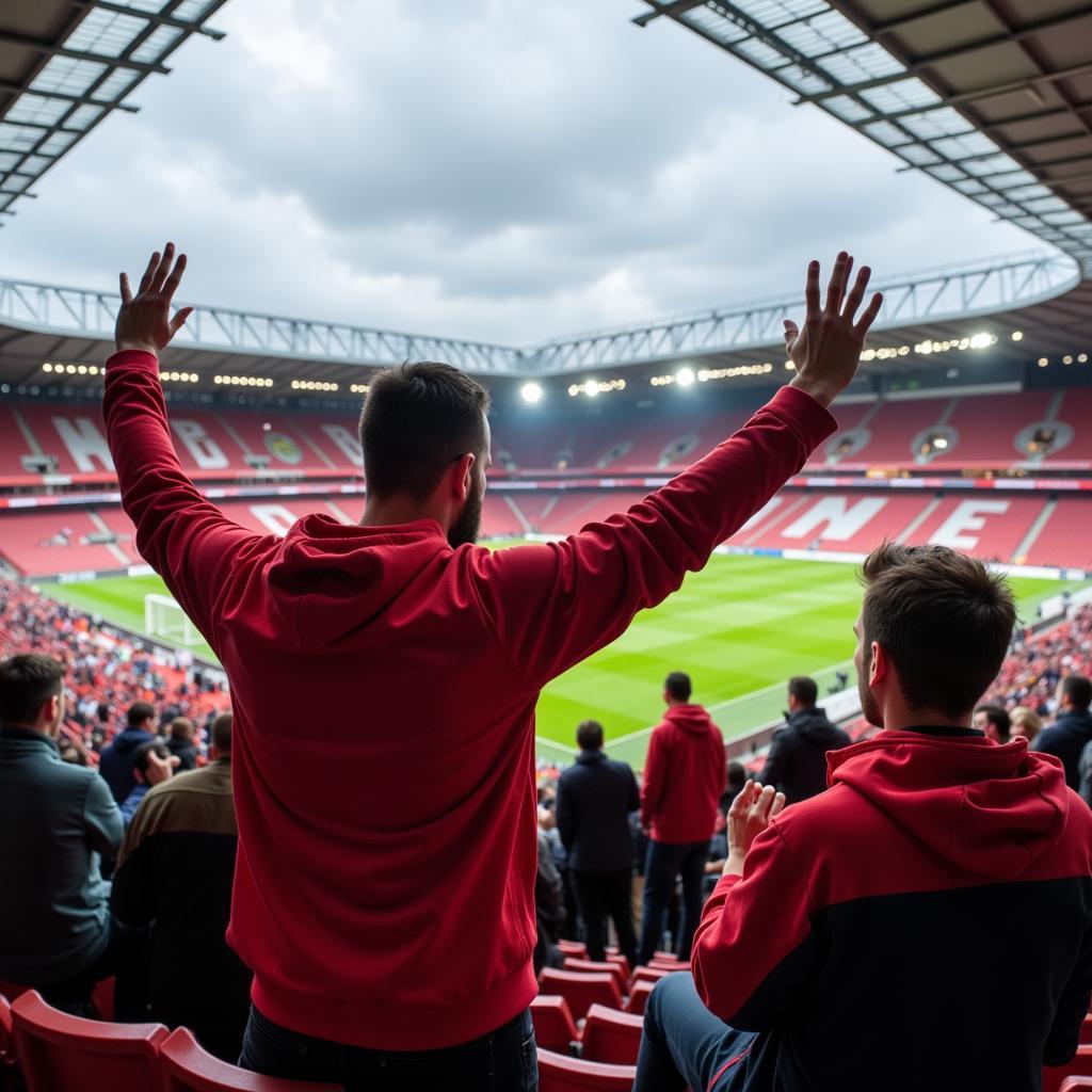 Bayer 04 Leverkusen Ticket-Hotline: Ein Fan ruft die Hotline an, um Tickets zu bestellen. Im Hintergrund sieht man das BayArena Stadion.