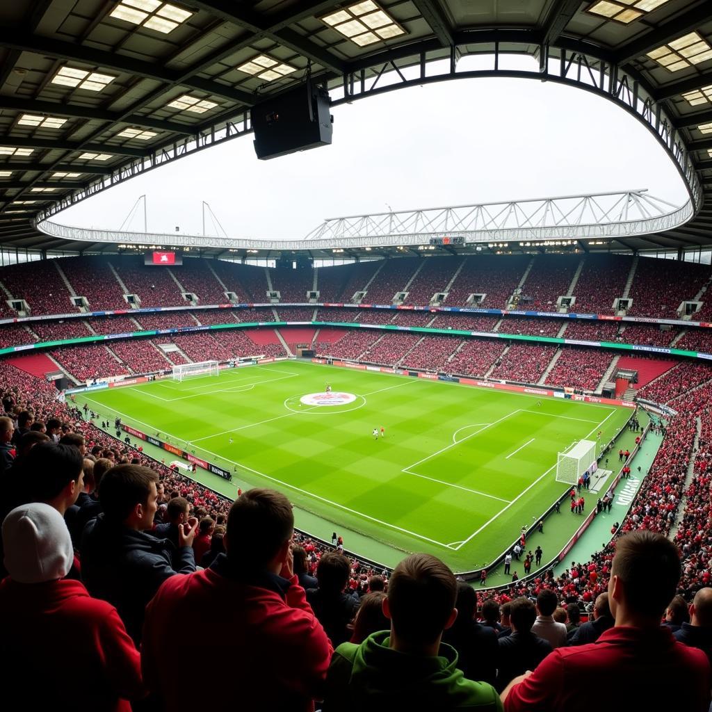 Fans im Stadion bei einem Spiel zwischen Bayer 04 Leverkusen und Werder Bremen