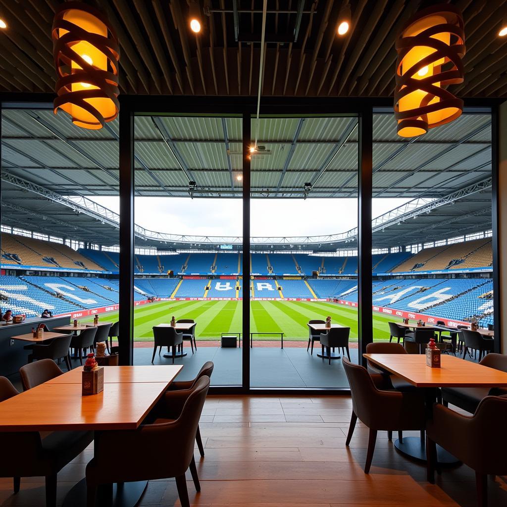 Innenansicht eines Restaurants in der BayArena mit modernem Ambiente und Blick auf das Spielfeld.