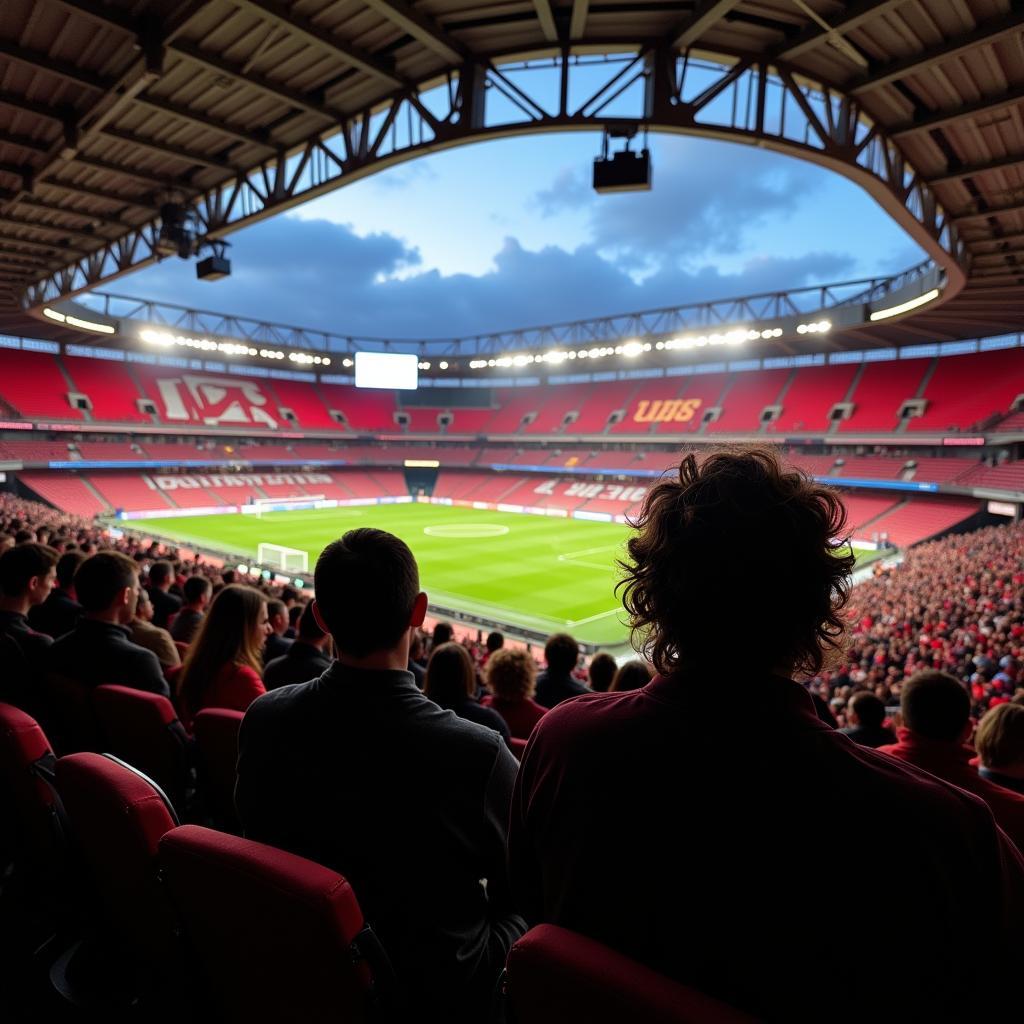 Bayer Leverkusen Fans im Stadion, verfolgen gespannt den Spielplan.