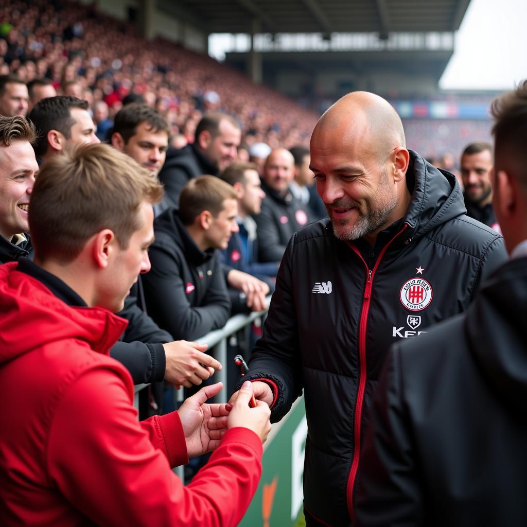 Bernd Schlör mit Fans von Bayer 04 Leverkusen