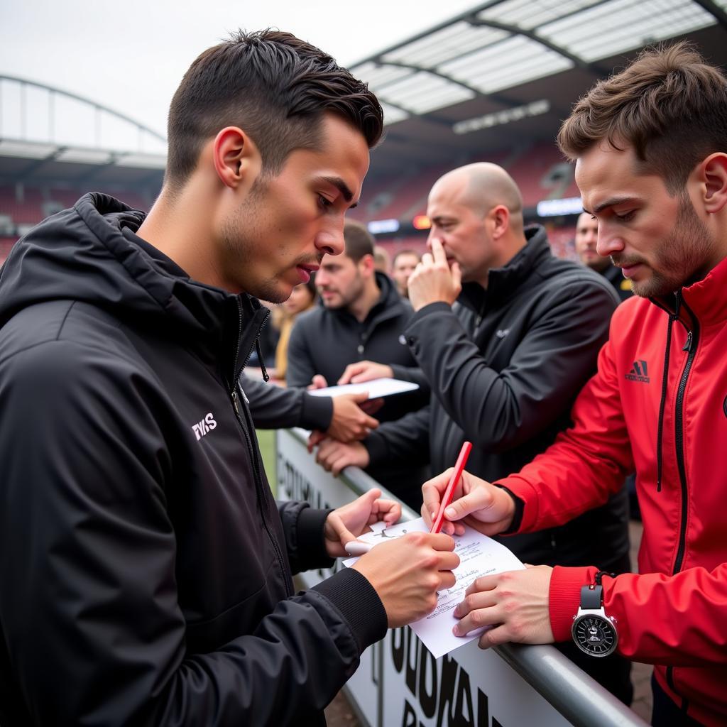 Ronaldo gibt Autogramme für Bayer Leverkusen Fans