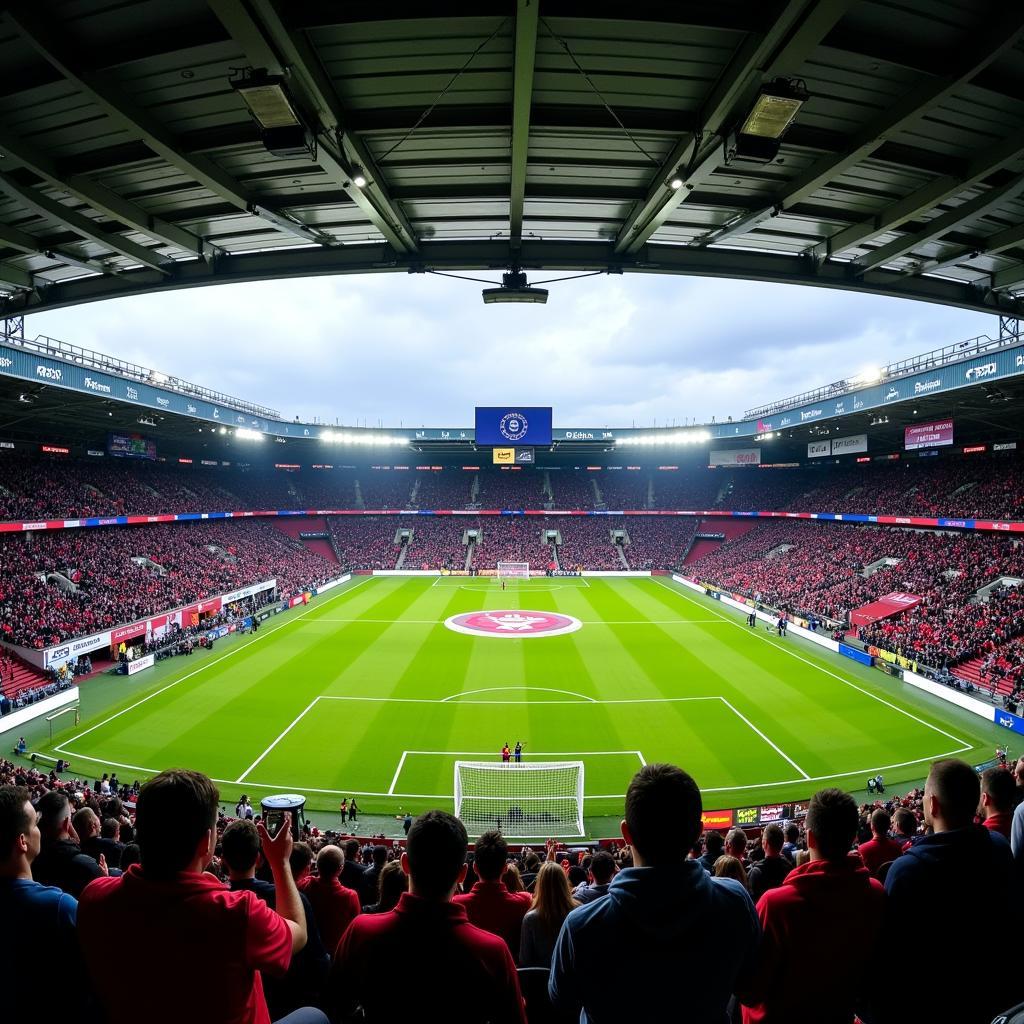 Fans beider Mannschaften im Stadion während des Spiels auf DAZN