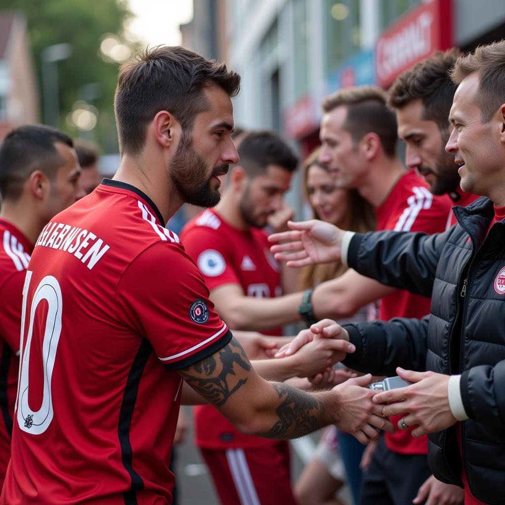 Bayer Leverkusen Spieler mit Fans