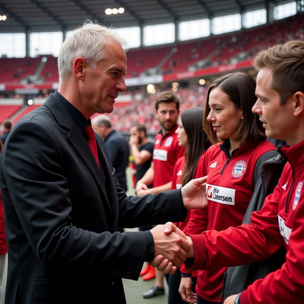 Frank Huettemann im Austausch mit Fans von Bayer Leverkusen.