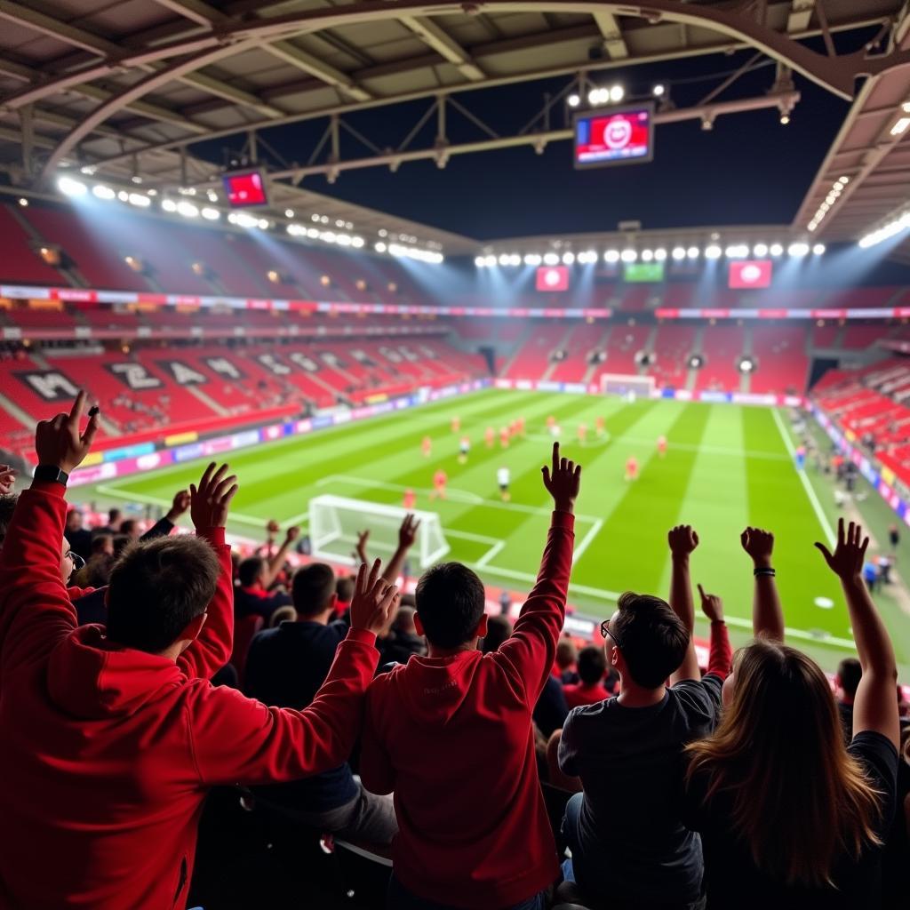 Fans im Stadion beim Spiel Freiburg gegen Leverkusen