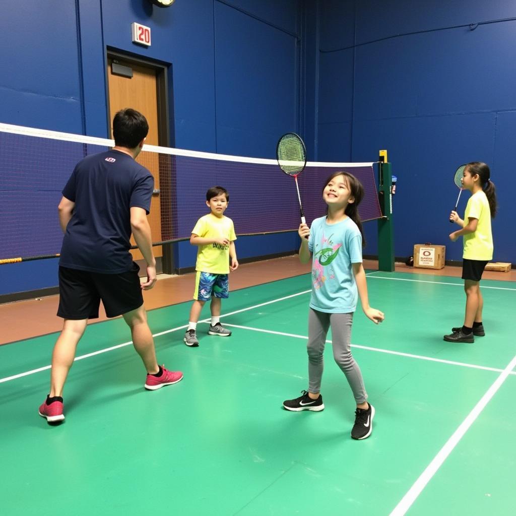 Jugendliche trainieren Badminton in Leverkusen Bergfried.