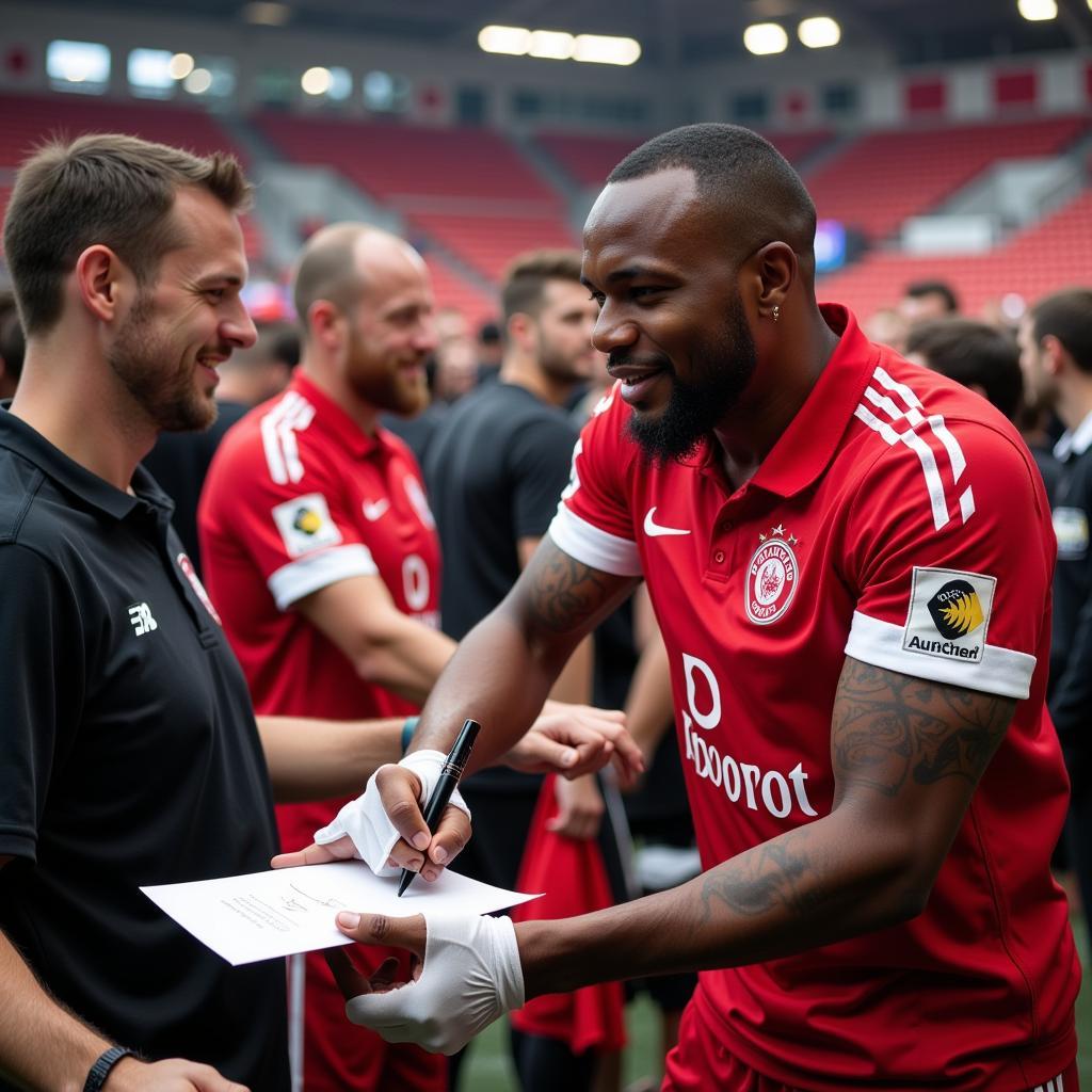 Meiko Leverkusen gibt Autogramme an Fans