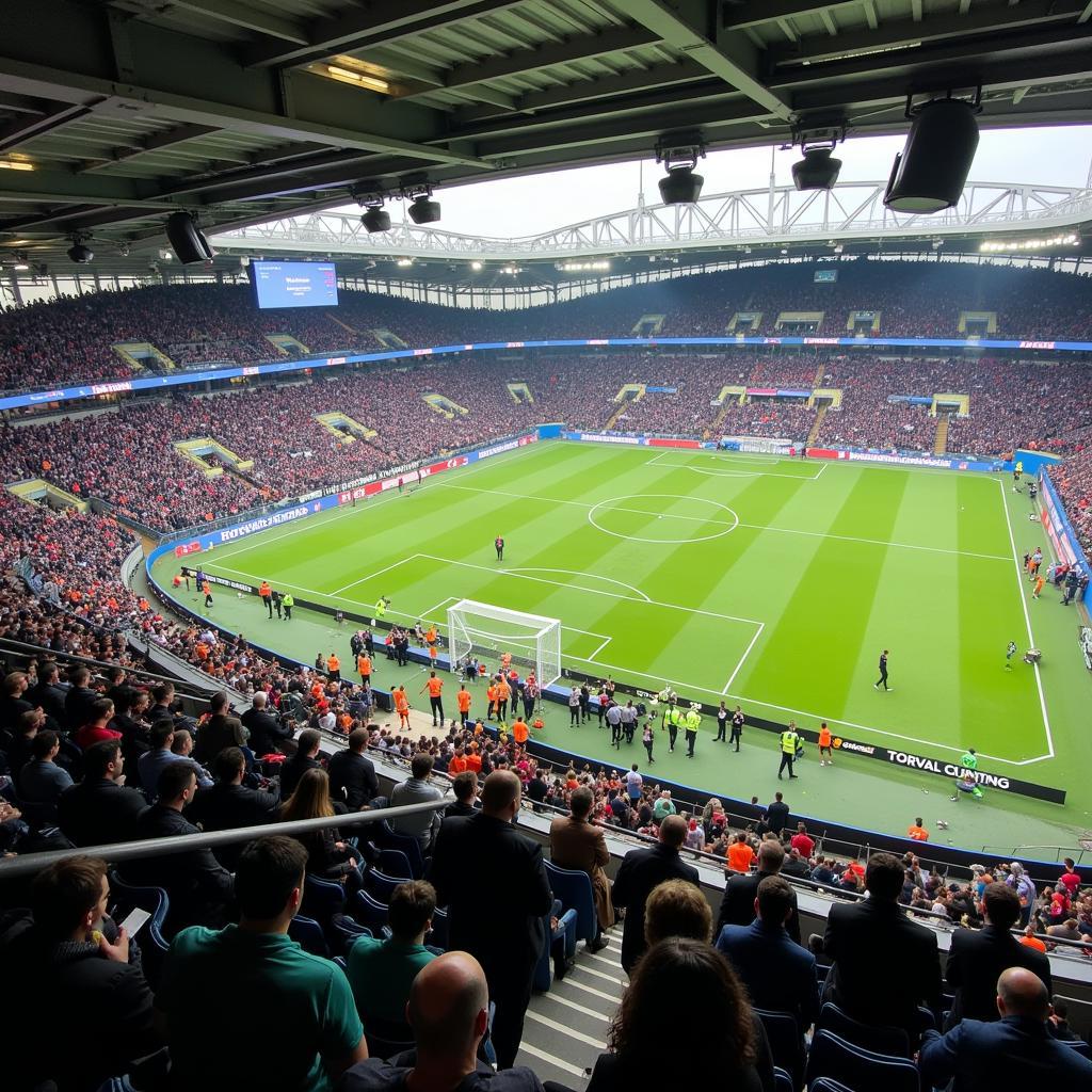 Sicherheitsmaßnahmen im Fussballstadion mit Polizeipräsenz